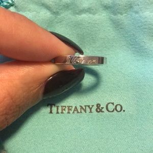 Tiffany & Co. ‘I Love You’ engraved ring.